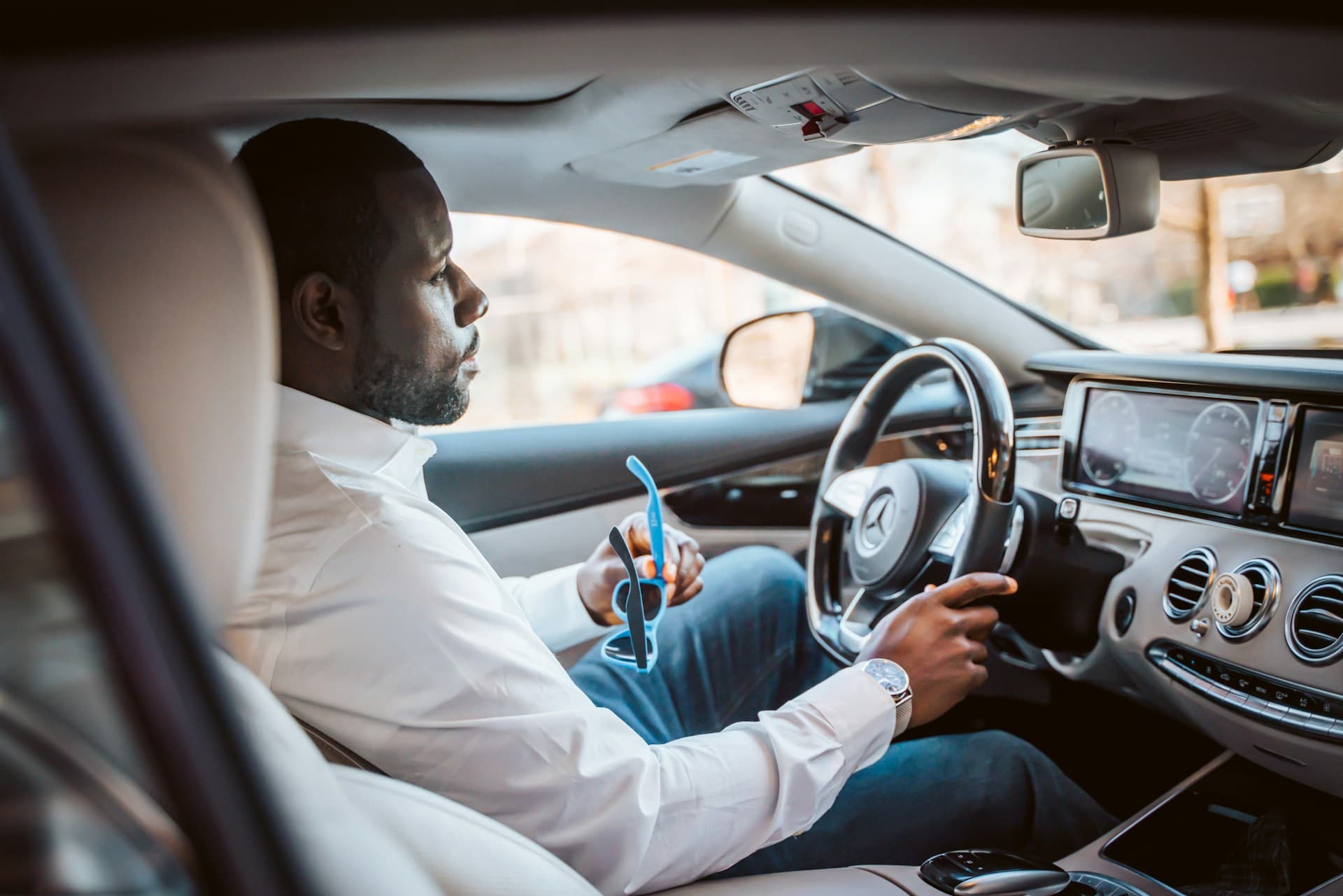 A man driving a car